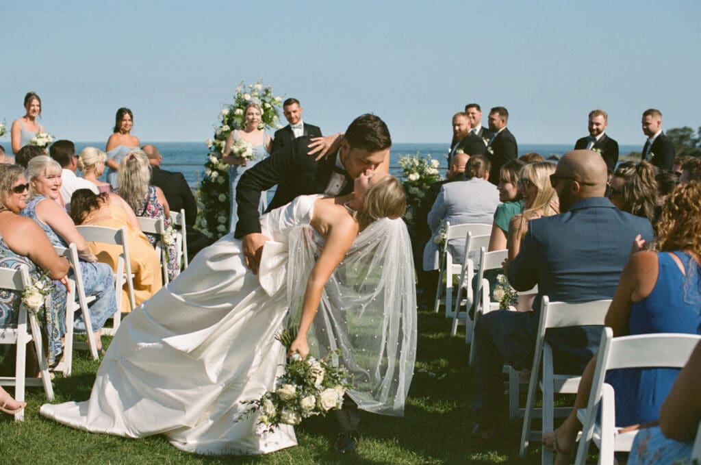 Emotional ceremony moments captured on film with natural light and romantic tones