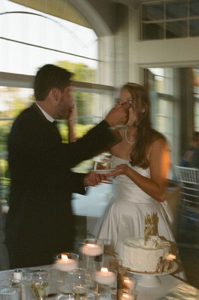 Bride and groom sharing a quiet moment captured in soft, romantic film light at  wedding