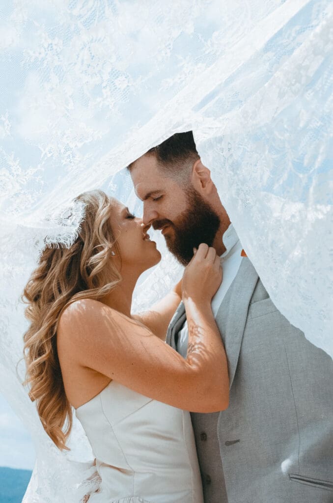 Emotional ceremony moments captured on film with natural light and romantic tones