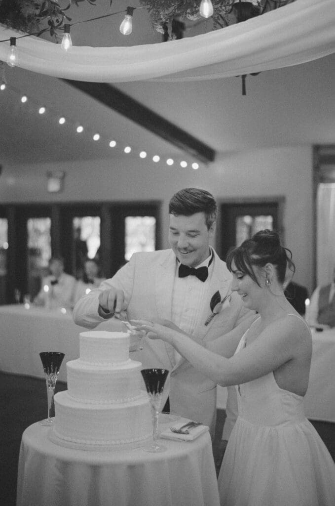 bride and groom cake cutting