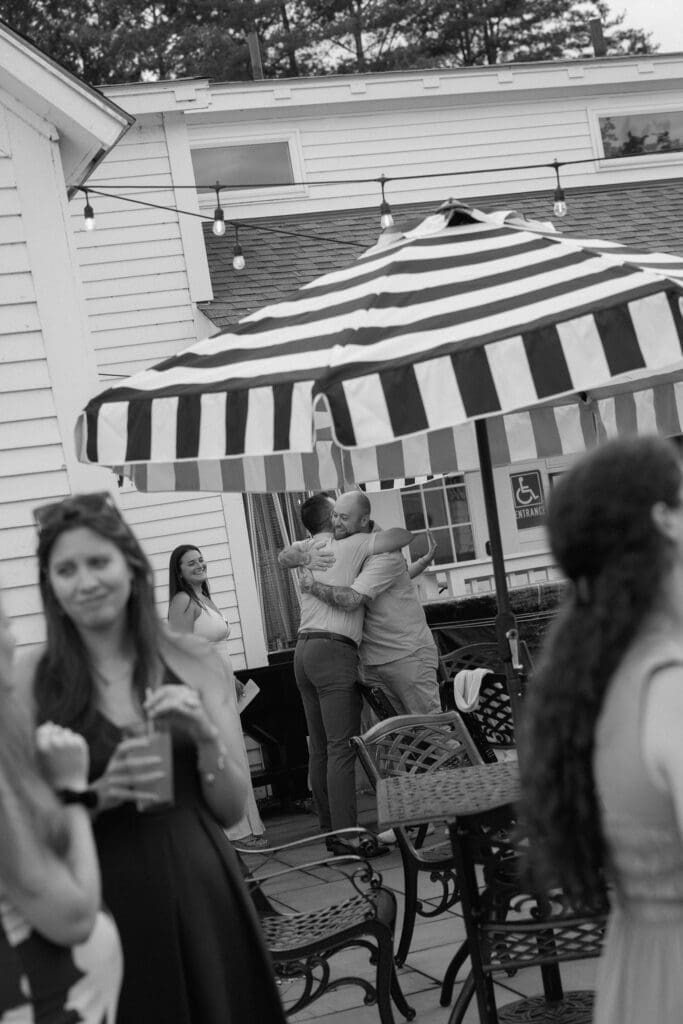Guests mingling in Vermont welcome dinner