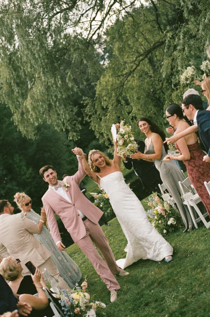 Bride and groom embracing during their Farm Road Estate wedding in Vermont