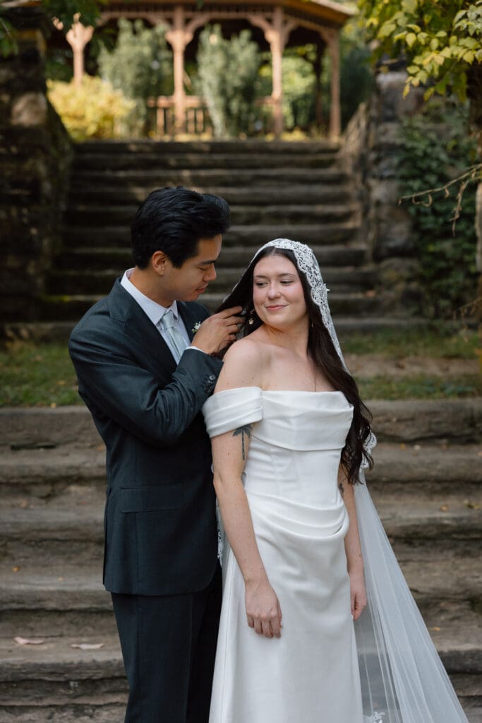 Wedding portrait on the stone garden steps at Parque at Ridley Creek
