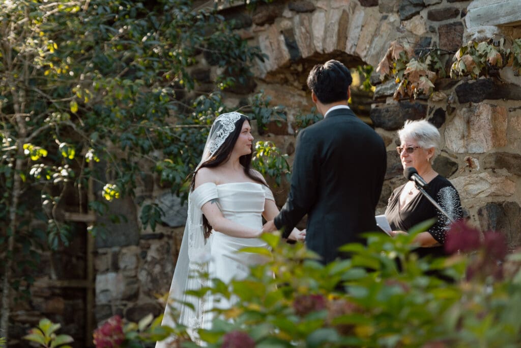 Bride and groom during their Parque at Ridley Creek wedding ceremony
