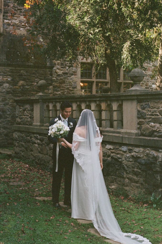 Bride and groom first look portrait on 35mm film 