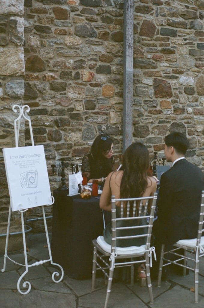 35mm film photo of tarot card readings during cocktail hour at Parque
