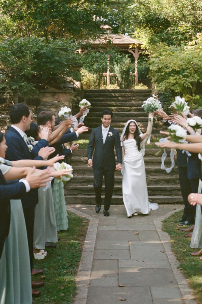 Bride and groom wedding exit photographed on 35mm film at Parque
